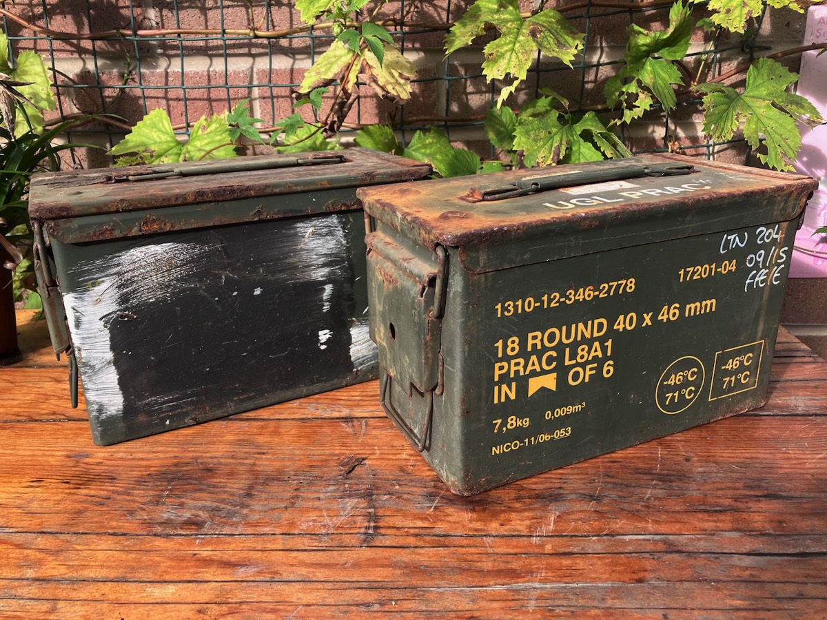 Two ammo boxes prior to preparation as patina-style rustic speakers